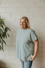 KIRBEE ROUND NECK TEAL TOP WITH FRONT STITCHING DETAIL